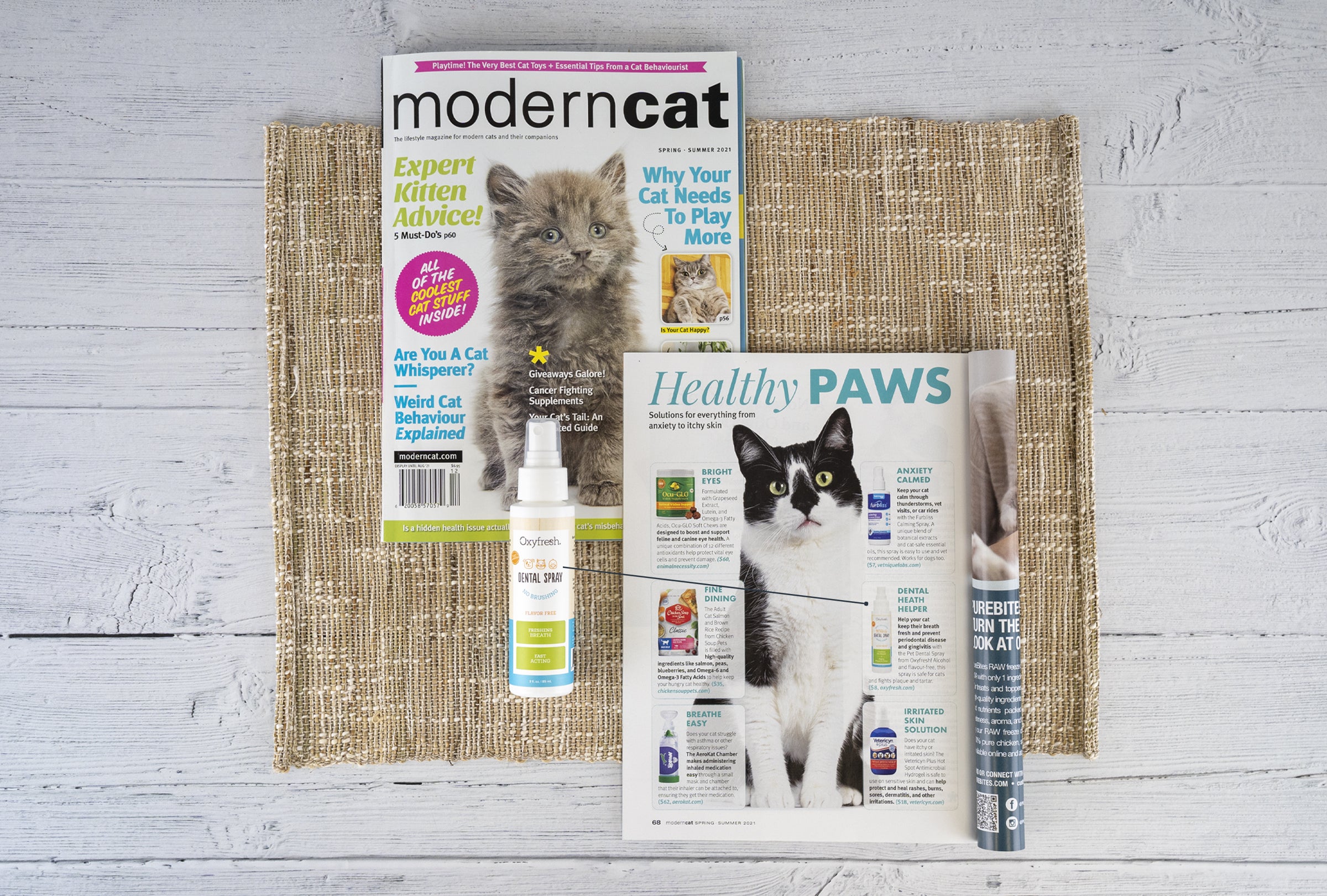 oxyfresh pet breath spray next to article in Modern Cat magazine