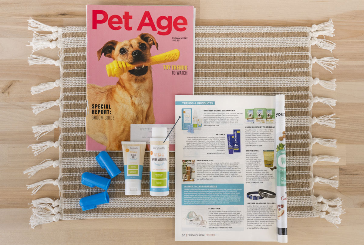 oxyfresh pet dental kit next to article in Pet Age magazine
