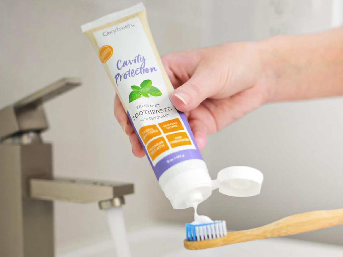 oxyfresh-cavity-protection-toothpaste_oxyfresh-cavity-prevention-toothpaste-being-put-on-toothbrush