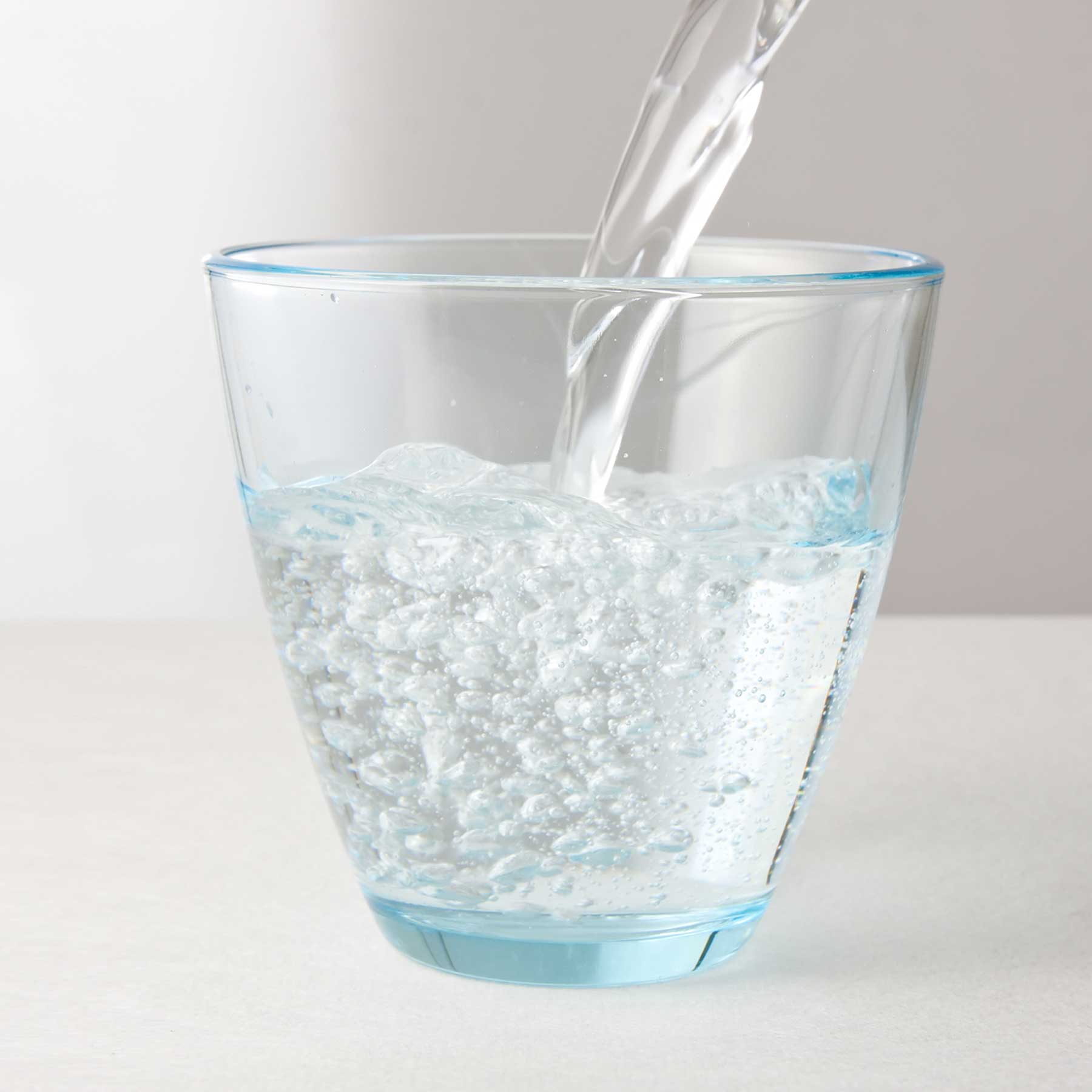 image of water with stabalized chlorine dioxiede being poured in a glass