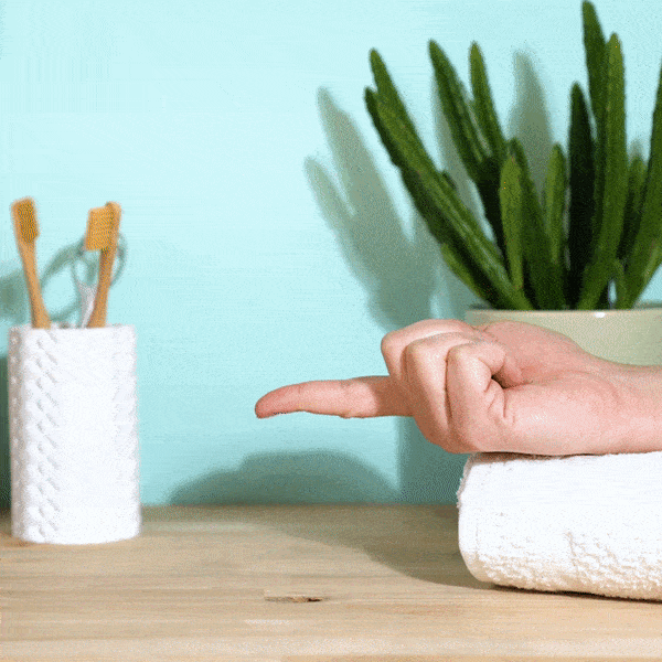 oxyfresh-pro-relief-dental-gel-being-squeezed-onto-finger